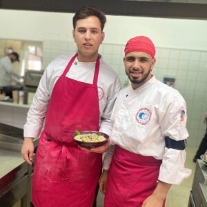 May be an image of 3 people and pasta